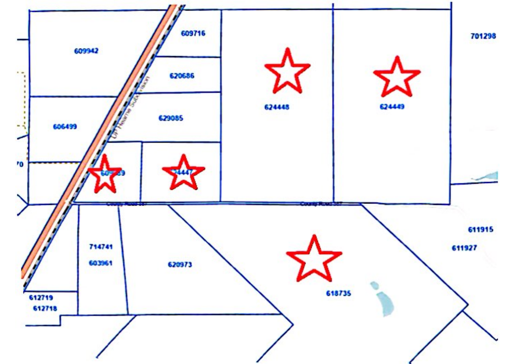 Parcel map of the proposed Crusoe reinvestment zone, with five tracts marked by red stars running along County Road 387 near Marquez